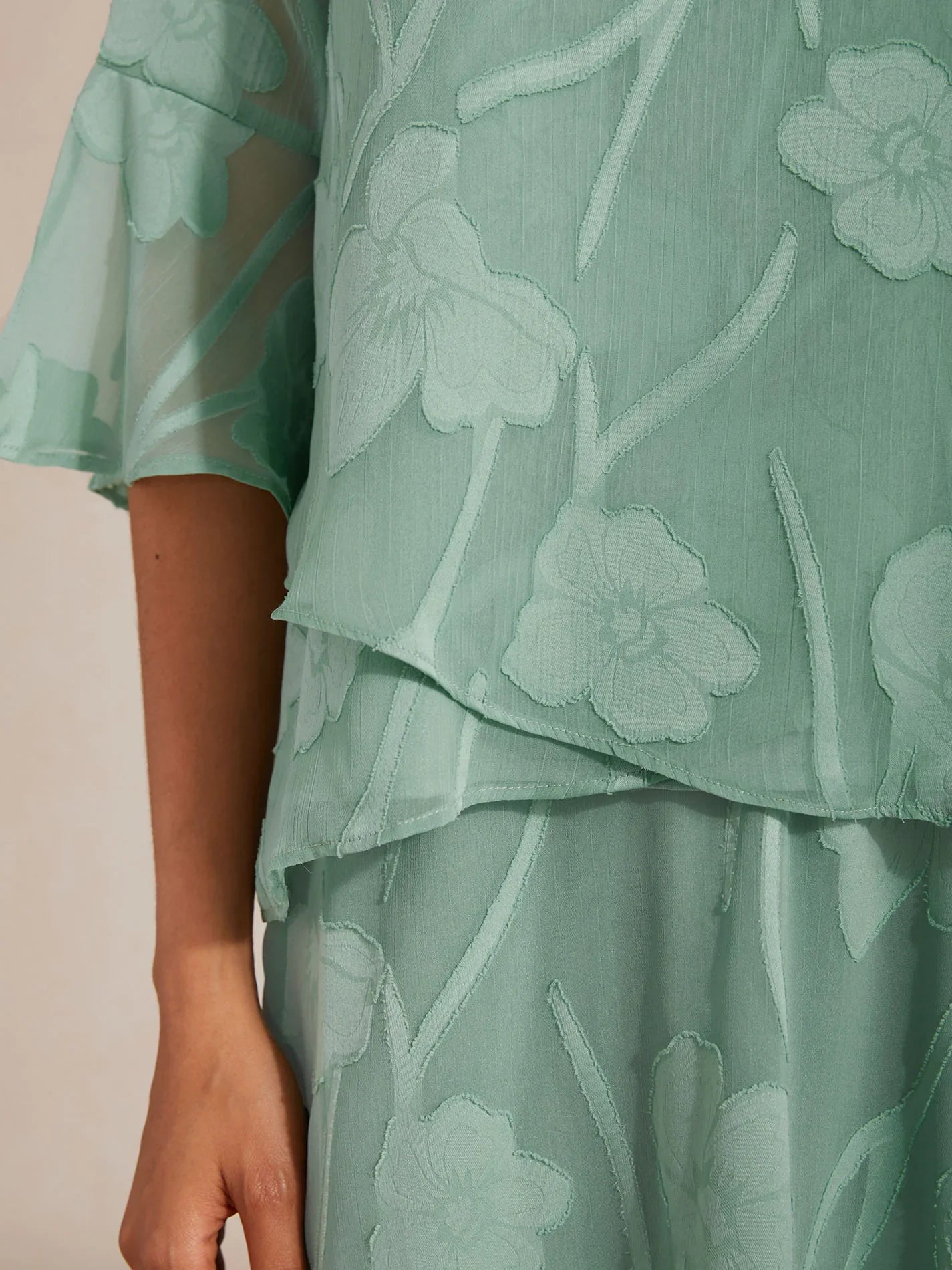 Blusa in Chiffon con Orlo Asimmetrico