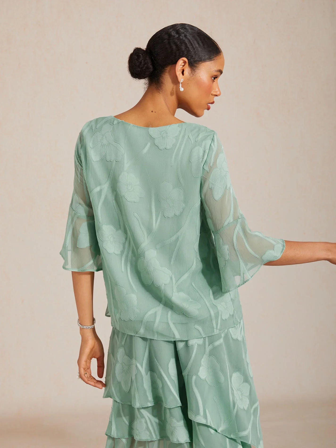Blusa in Chiffon con Orlo Asimmetrico