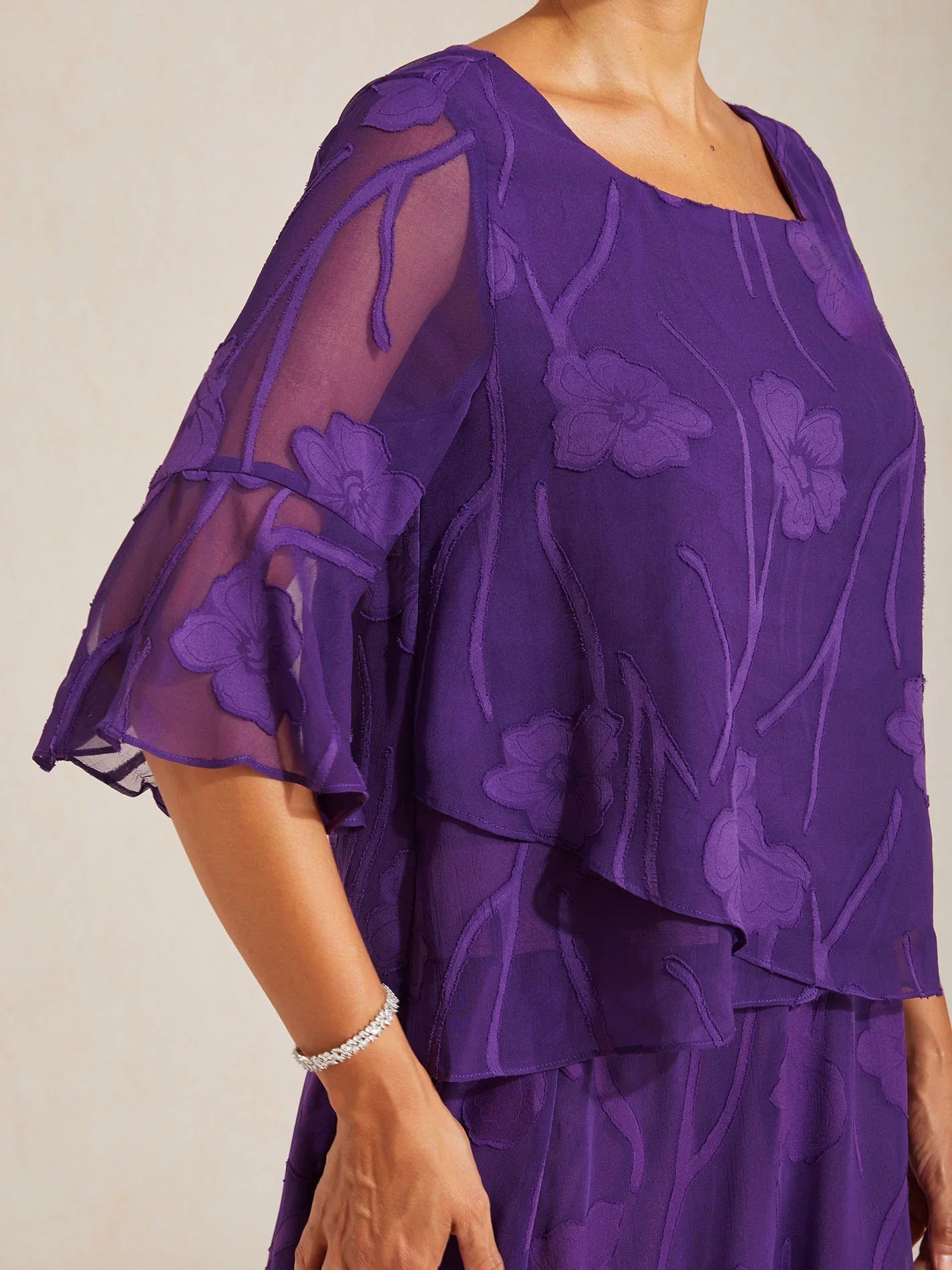 Blusa in Chiffon con Orlo Asimmetrico