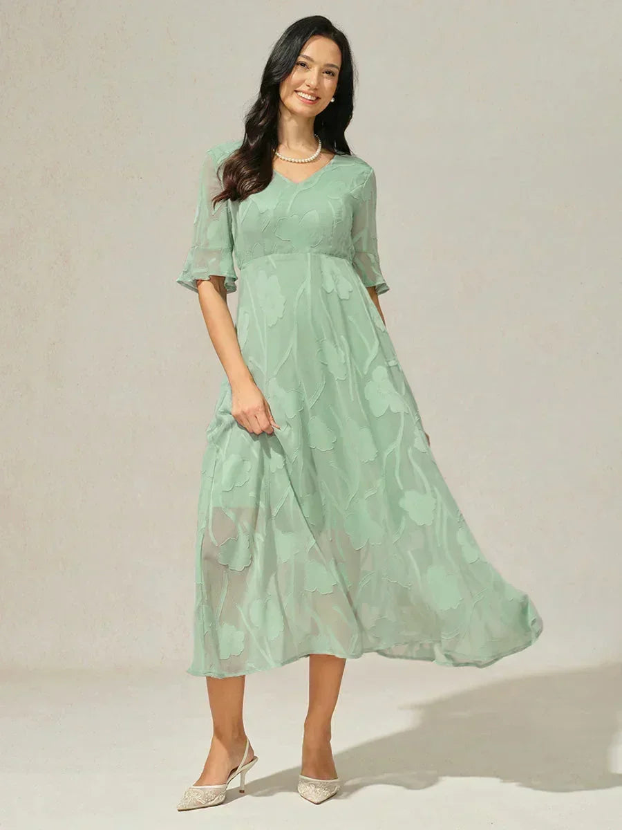 Abito Maxi in Pizzo con Maniche Fluttuanti