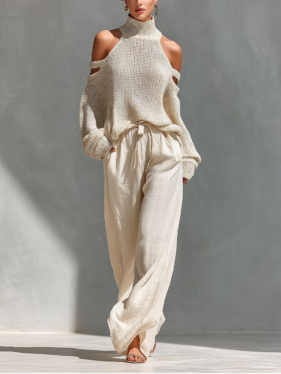 Set top con colletto alto e spalline fredde in cotone color beige e pantaloni larghi