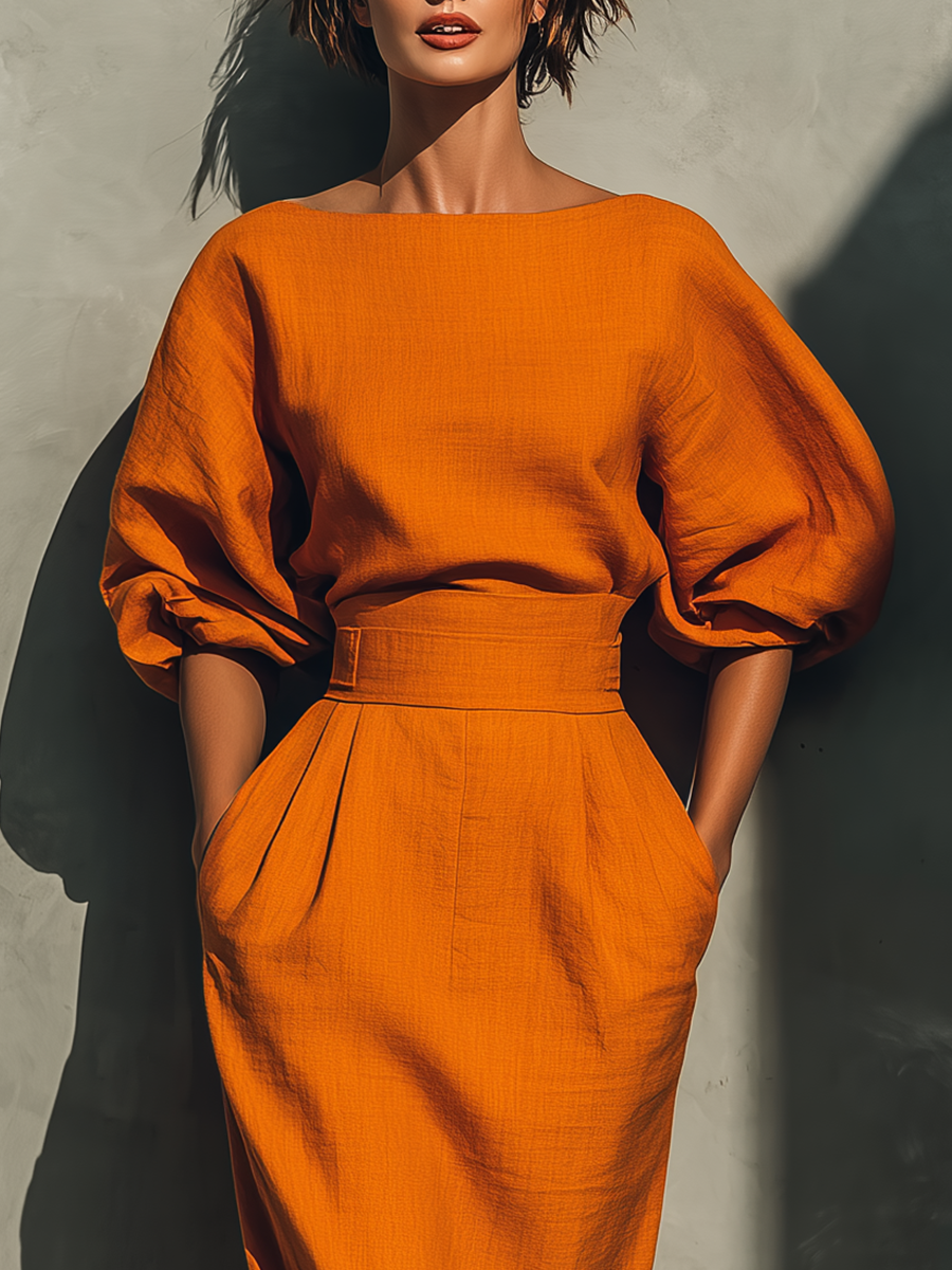Set top con maniche medie e gonna midi per donne in colore arancione