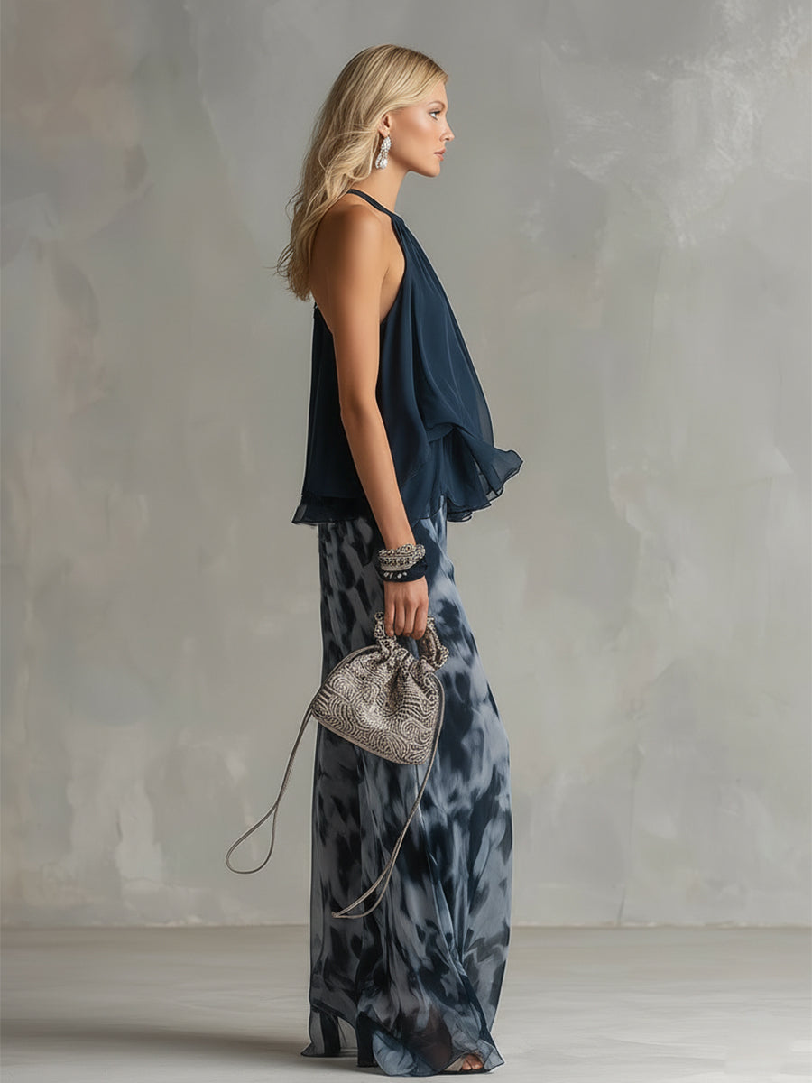 ESSENZIALE - Ludovica – Set elegante in chiffon con top a collo alto e pantaloni larghi stampati
