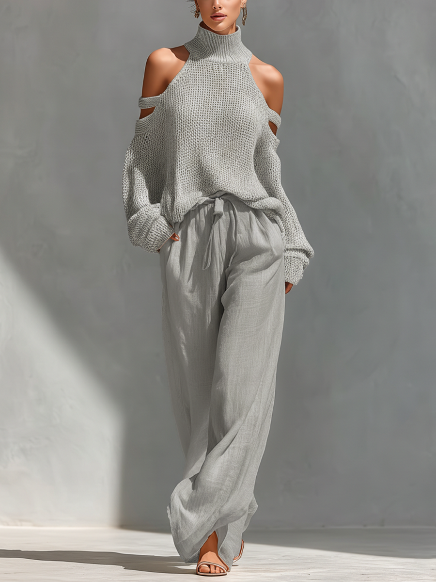 Set top con colletto alto e spalline fredde in cotone color beige e pantaloni larghi
