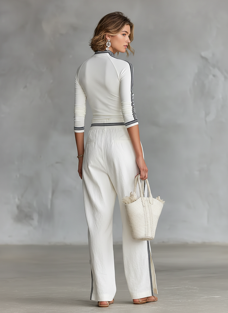Maglietta lunga con colletto mezzo alto per donne e pantaloni larghi con cordino - set a due pezzi