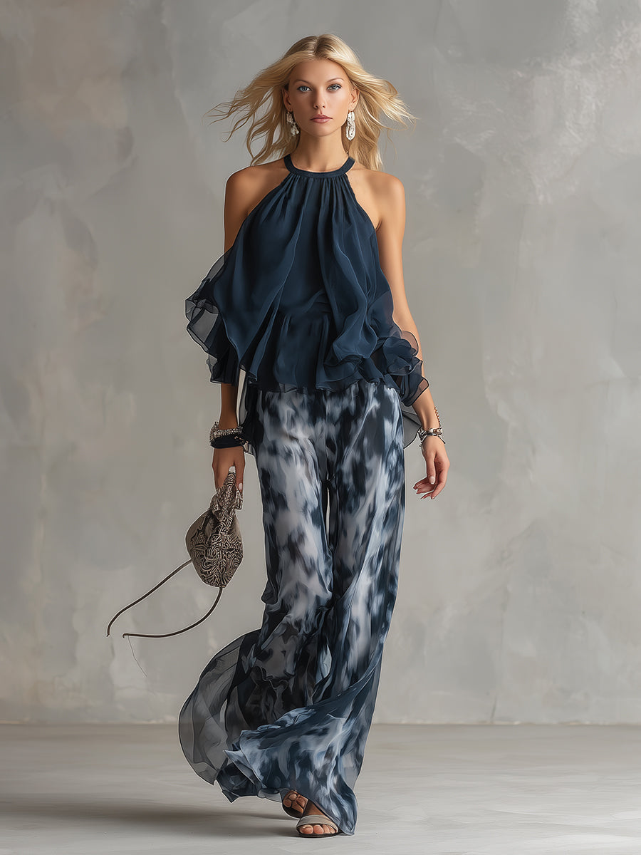 ESSENZIALE - Ludovica – Set elegante in chiffon con top a collo alto e pantaloni larghi stampati