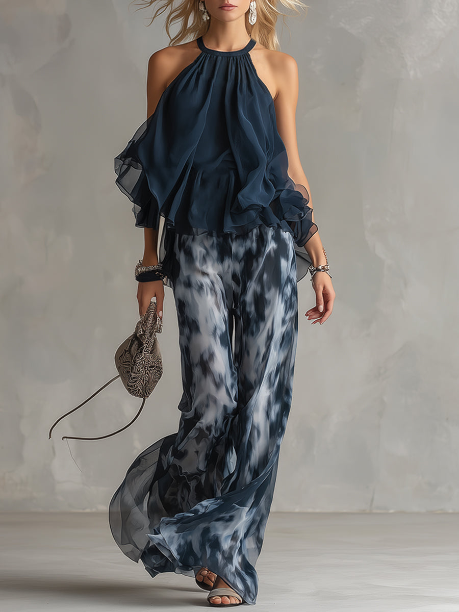 ESSENZIALE - Ludovica – Set elegante in chiffon con top a collo alto e pantaloni larghi stampati