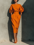 Set top con maniche medie e gonna midi per donne in colore arancione