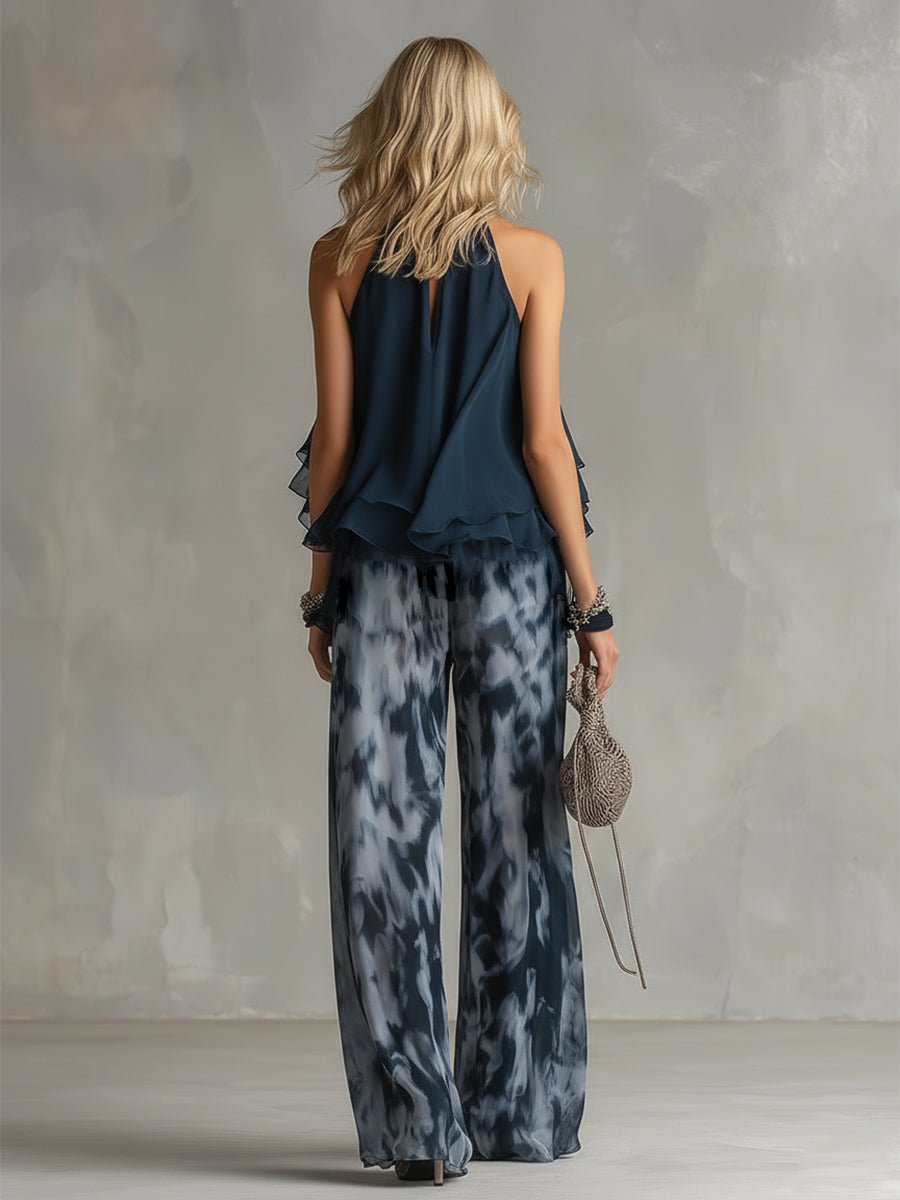 ESSENZIALE - Ludovica – Set elegante in chiffon con top a collo alto e pantaloni larghi stampati
