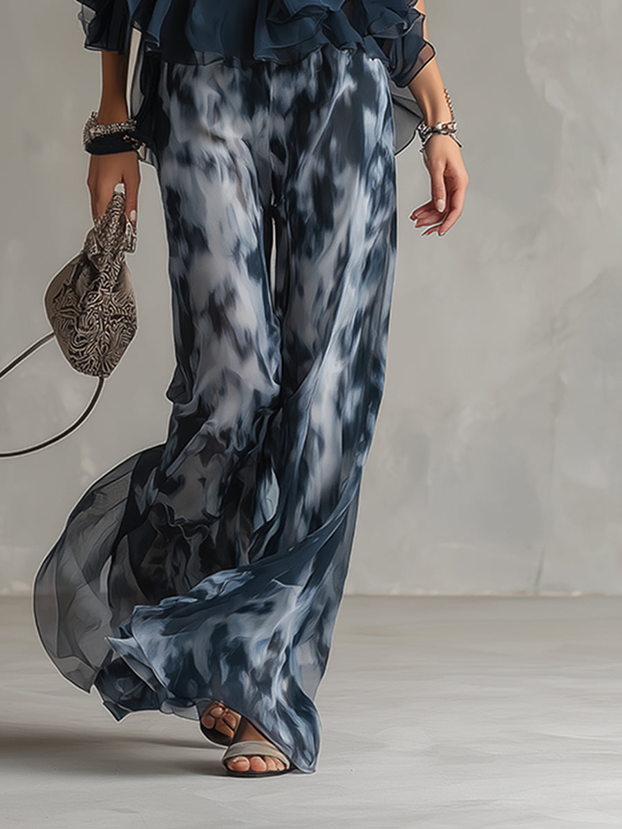 ESSENZIALE - Ludovica – Set elegante in chiffon con top a collo alto e pantaloni larghi stampati