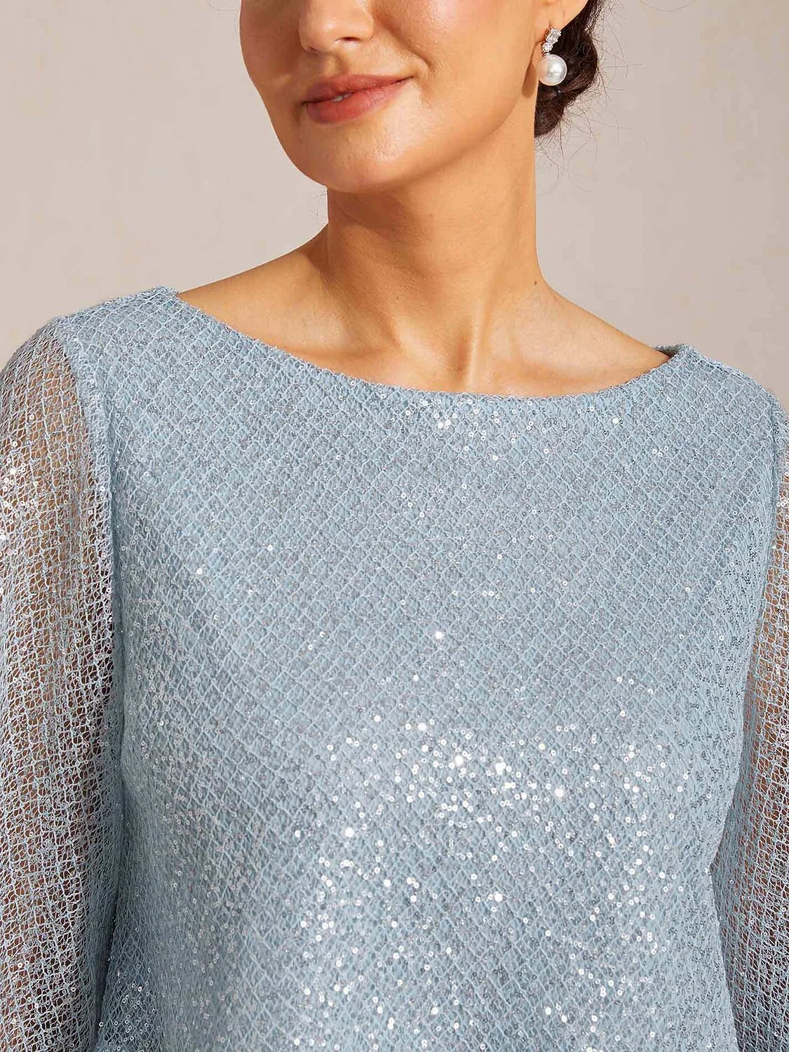 Top a strati in rete con paillettes e maniche a campana